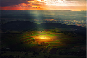Sunlit Farmland Landscape in Austria, a Nature Photo by Nature and travel