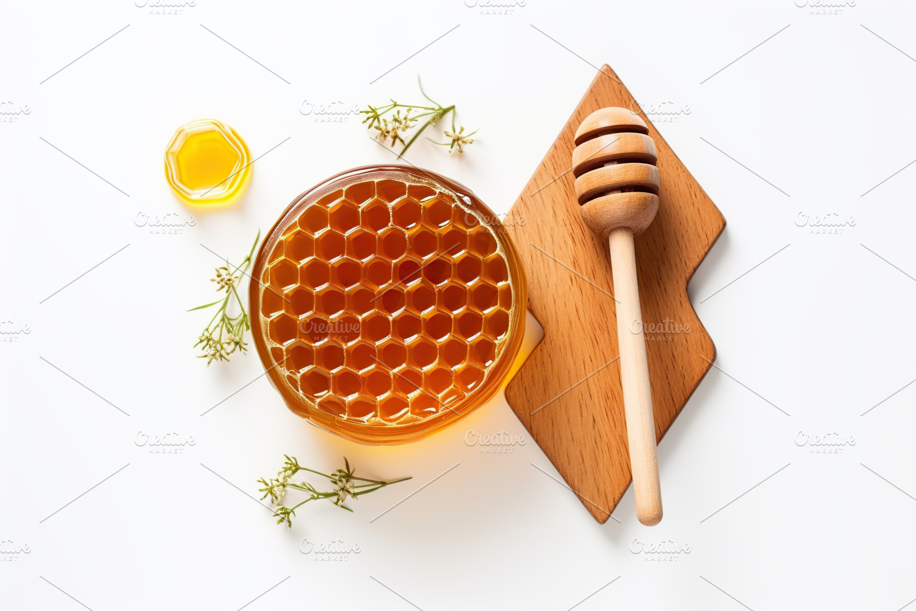 Honeycomb with honey and honey dipper on white background, a Food & Drink Photo by AlyaAnd