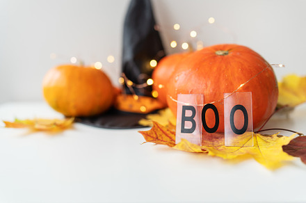 Autumn leaves with pumpkin border at the bottom, black hat, beautiful autumn ba, a Holiday Photo by Artsaba Family