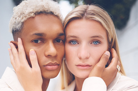 Love, interracial couple and portrait hug with young African man and white woman together. Romantic, attractive and caring multiracial people embracing each other in diverse relationship., a Photo by Peopleimages.com