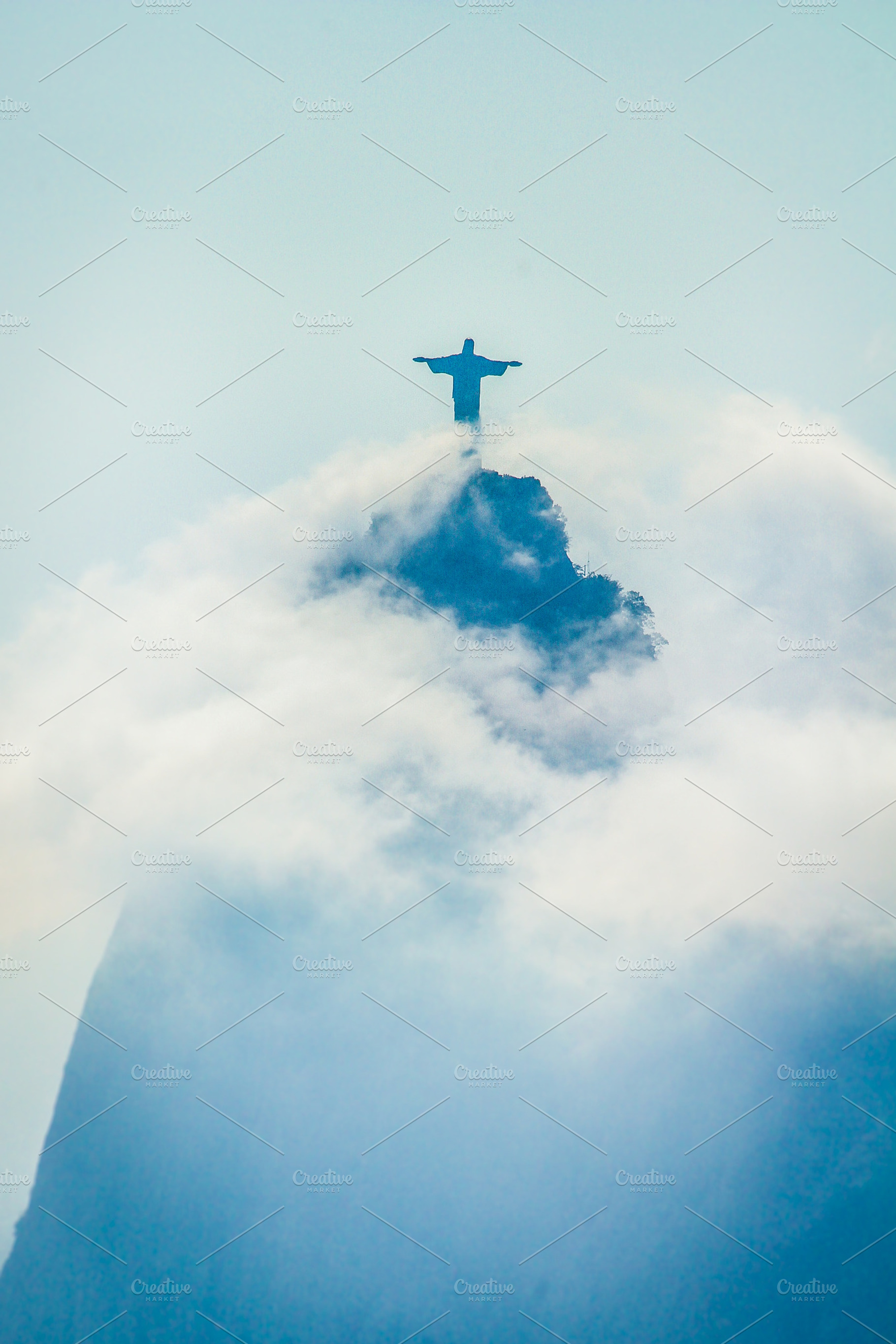 Christ the redeemer containing christ the redeemer, fog, and clouds, a Holiday Photo by doefler