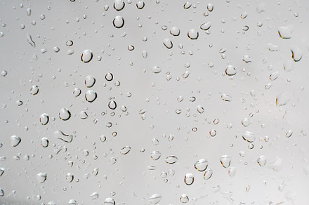 Water drops over a glass surface