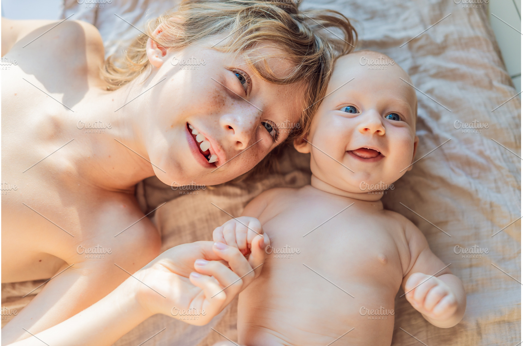 Older and younger baby brothers, a Person Photo by Elizaveta Galitskaya