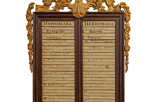 Ornate golden religious plaque on white wall, an Arts & Entertainment Photo by DanFLCreativo