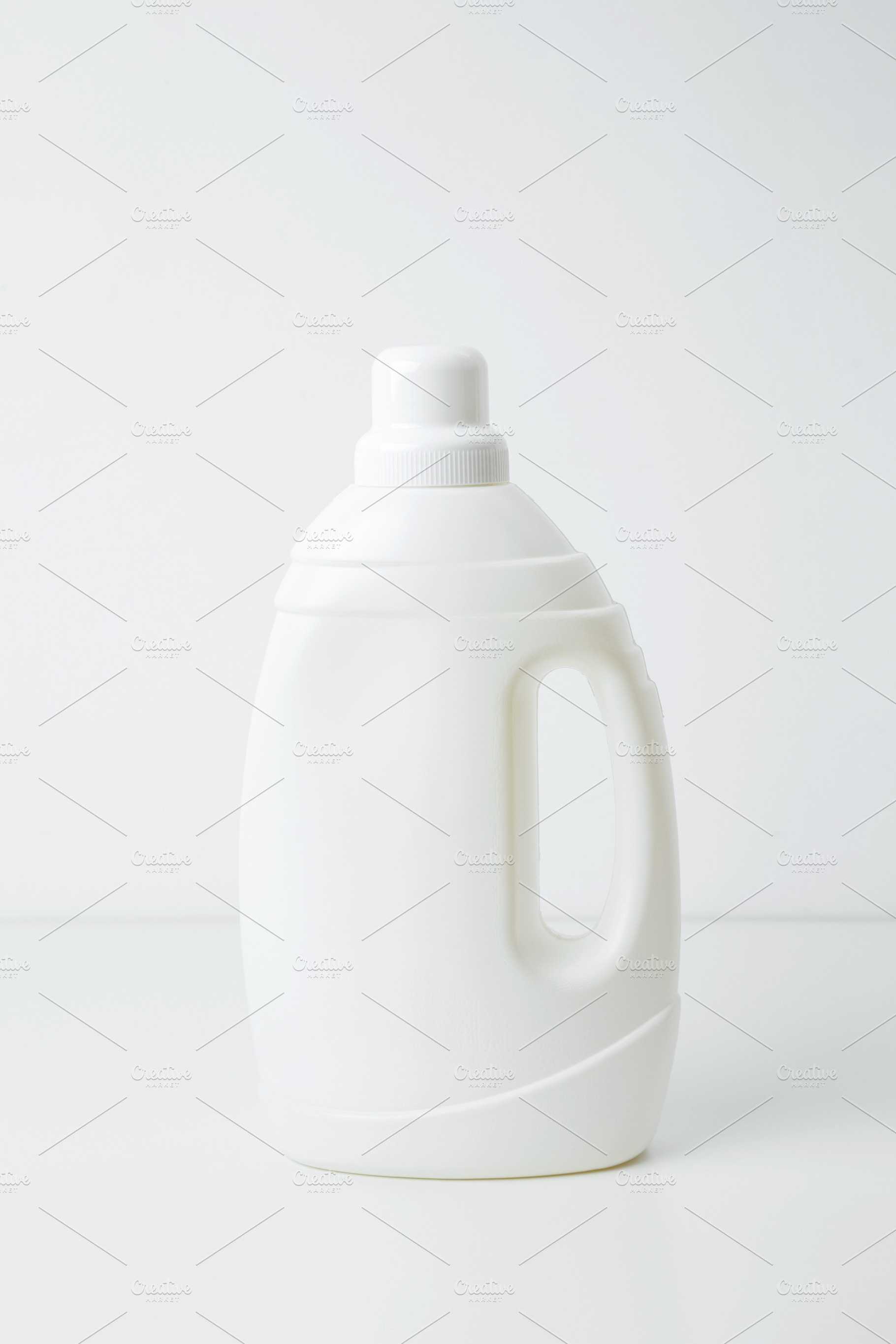 White branding mockup of laundry gel. Household cleaning and hygiene concept pa, a Photo by matucha
