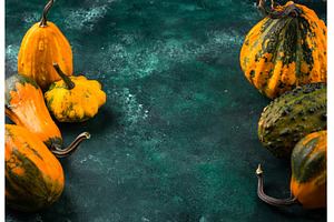 Various decorative pumpkin on green, a Holiday Photo by Yulia Furman