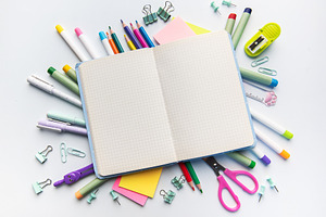 Open notebook with school supplies for education and creativity, a School & Education Photo by Olena Rudo