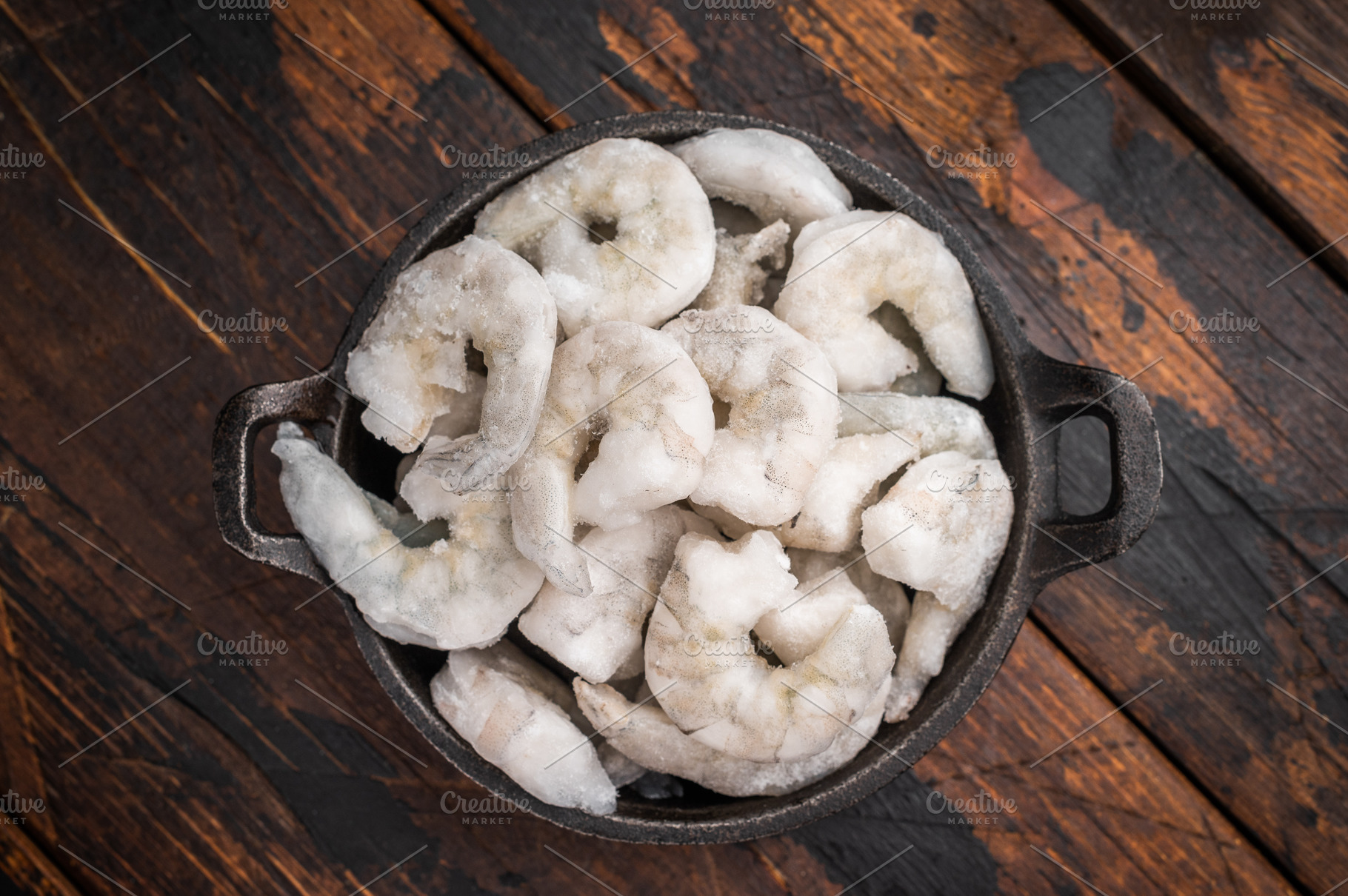 Frozen raw shrimp prawn on a dark rustic wooden background with, a Food & Drink Photo by composter-box@mail.ru