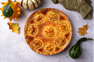Halloween apple pie with scary faces, a Food & Drink Photo by Yulia Furman