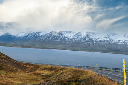 Highway road and mountain view during auto trip in Iceland. Spec, a Nature Photo by YuriyB