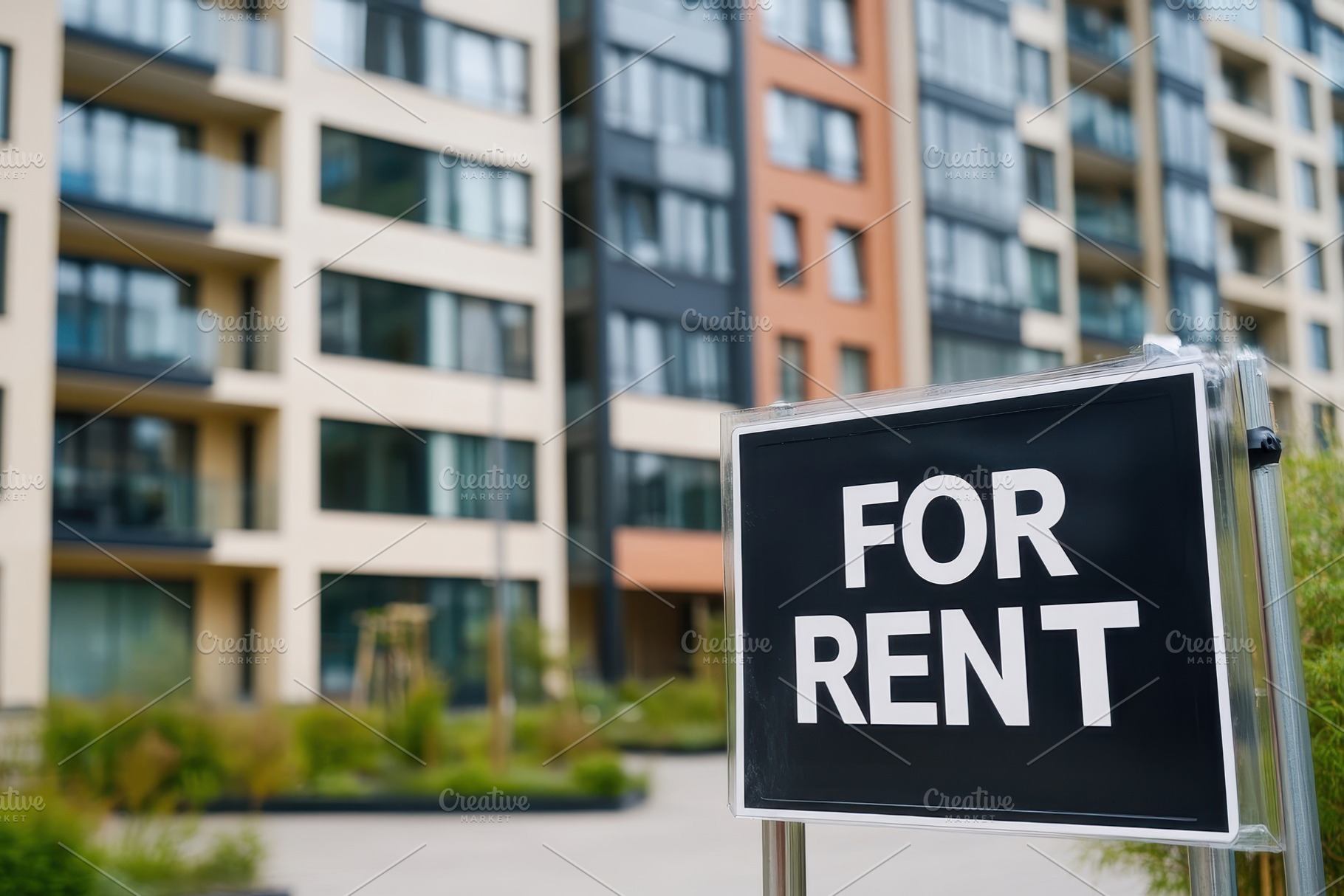 For rent sign stands in front, a Photo by Pavel_design