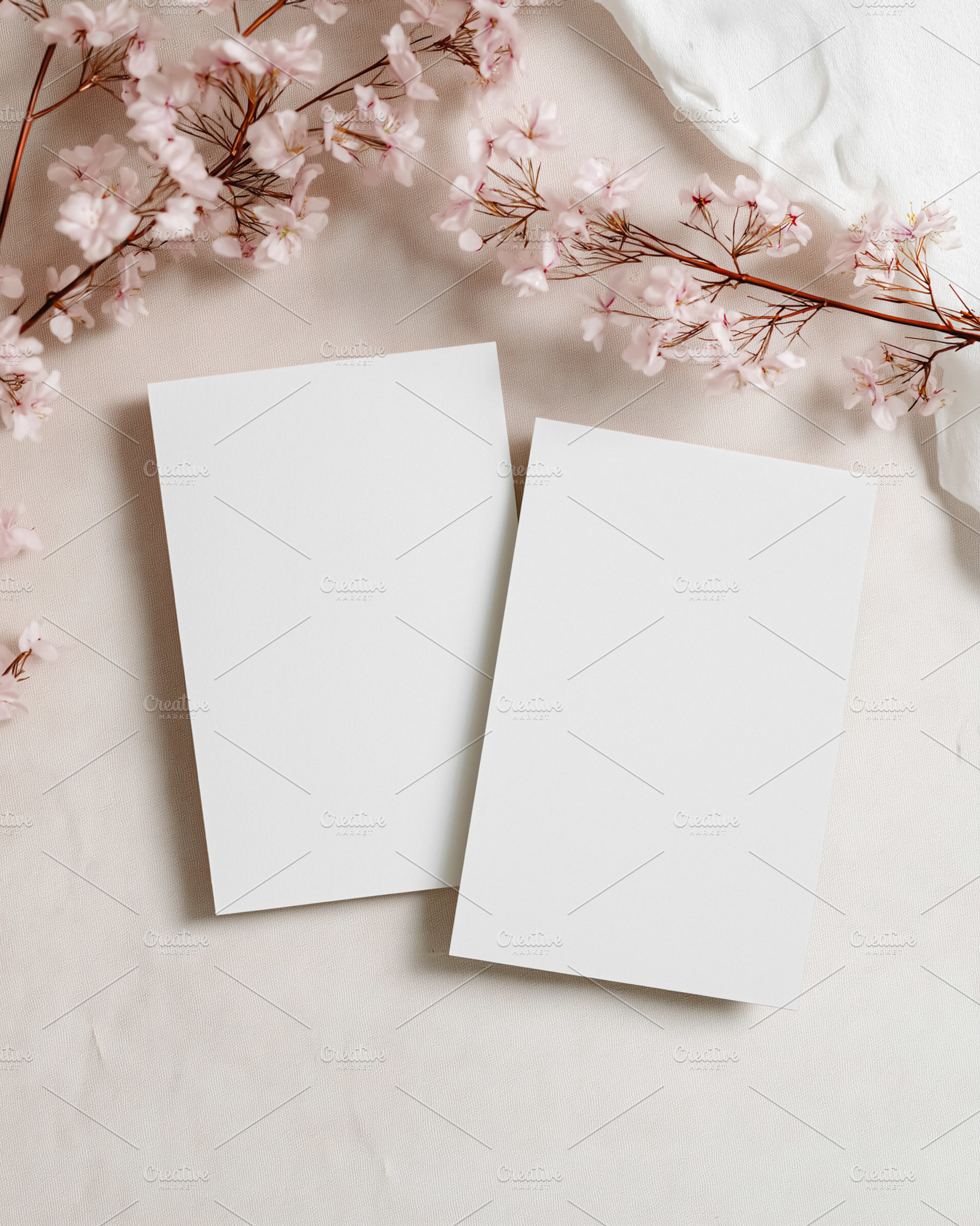 Blank white invitation cards mockup with blooming cherry blossoms for elegant s, a Holiday Photo by Studio ANNA