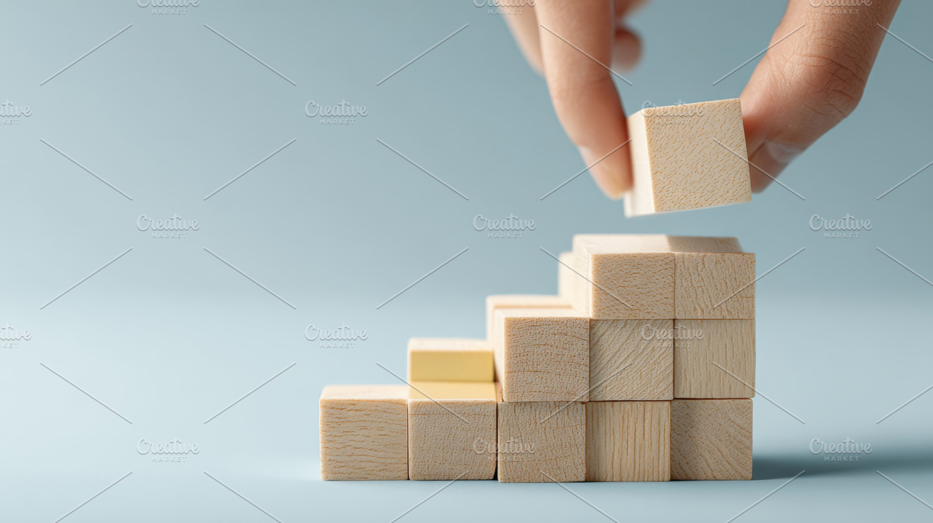 Building steps with wooden blocks, a Photo by Beautiful things