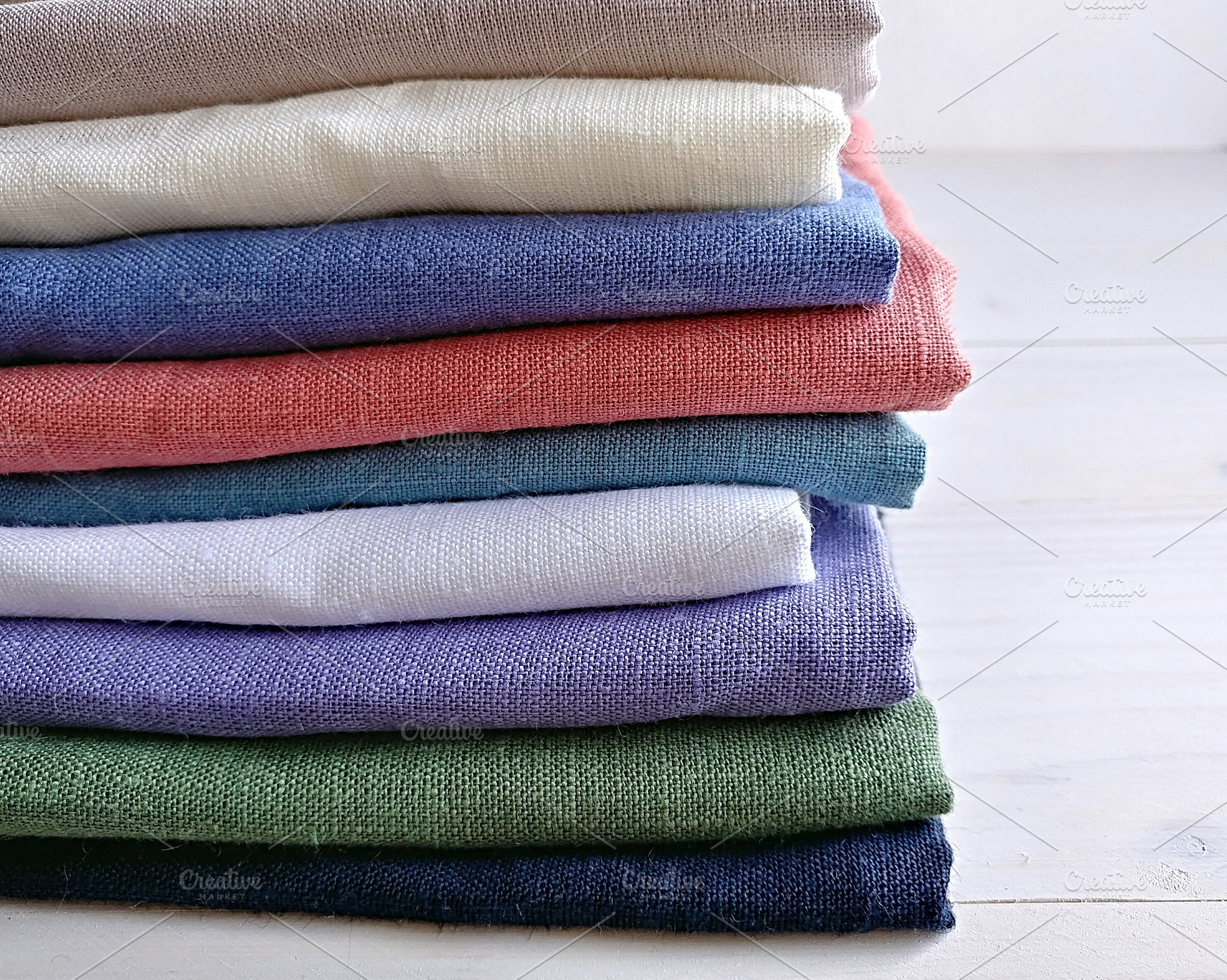 Pile of linen fabrics stock photo containing linen and fabric, a Beauty & Fashion Photo by OksanaAn