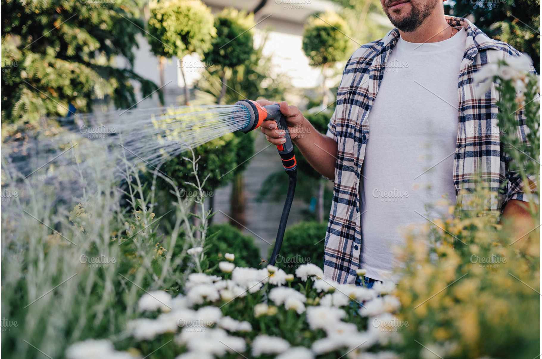 Close up of garden center worker, a Nature Photo by HalfPoint