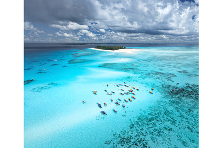 Aerial view of boats in clear azure, a Nature Photo by den-belitsky
