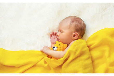 Newborn baby sleeping on a white, a Beauty & Fashion Photo by yanadjana
