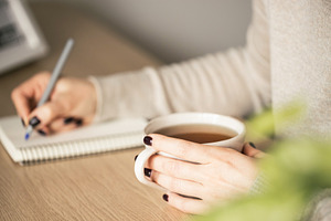 Woman holding a cup of tea