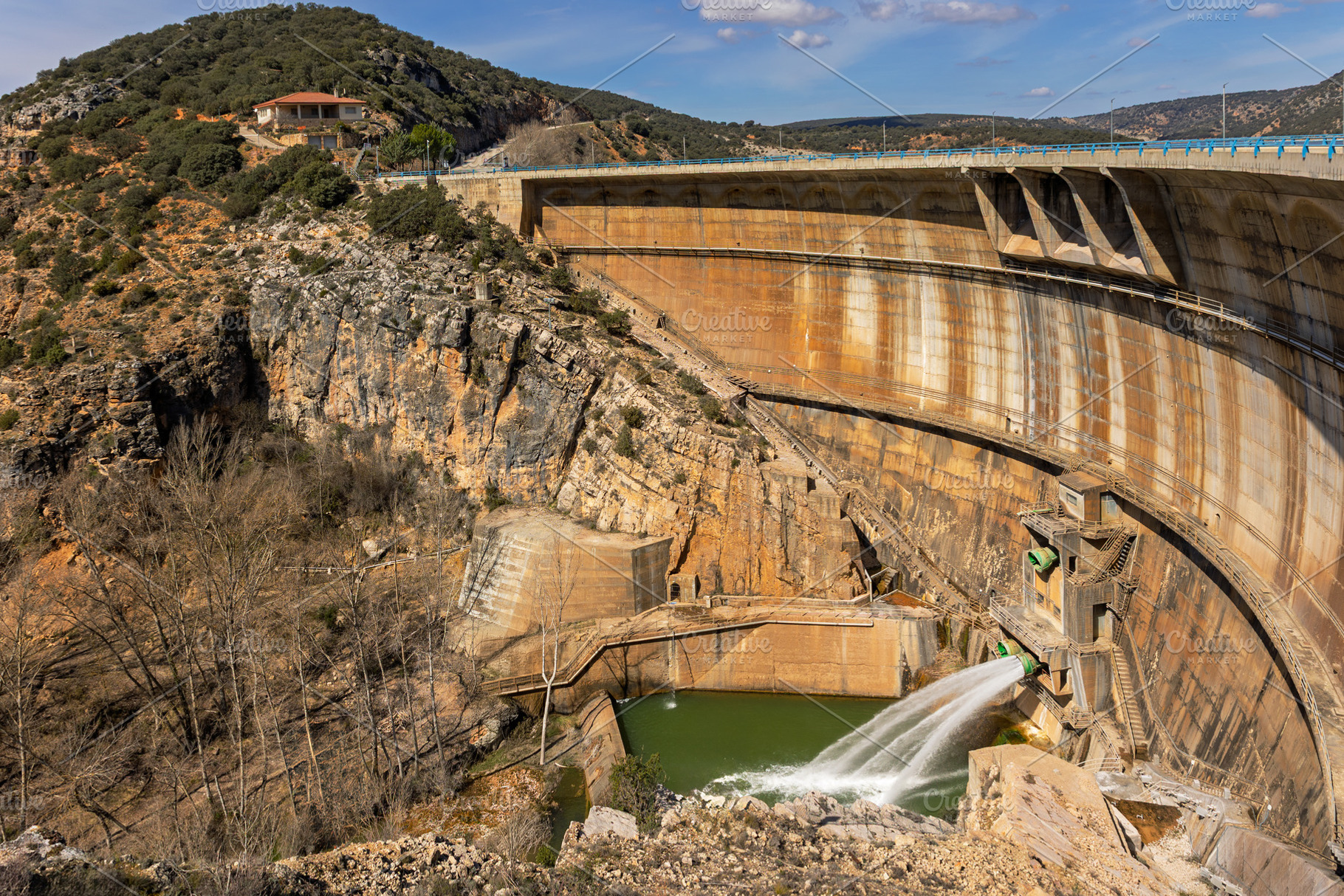 Large Curved Dam with Water Discharg, an Architecture Photo by Perpis