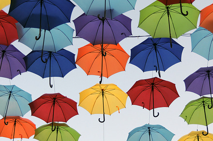 Colorful umbrellas containing sky, blue, and yellow