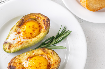 Baked eggs in avocado, a Food & Drink Photo by Alexander Prokopenko