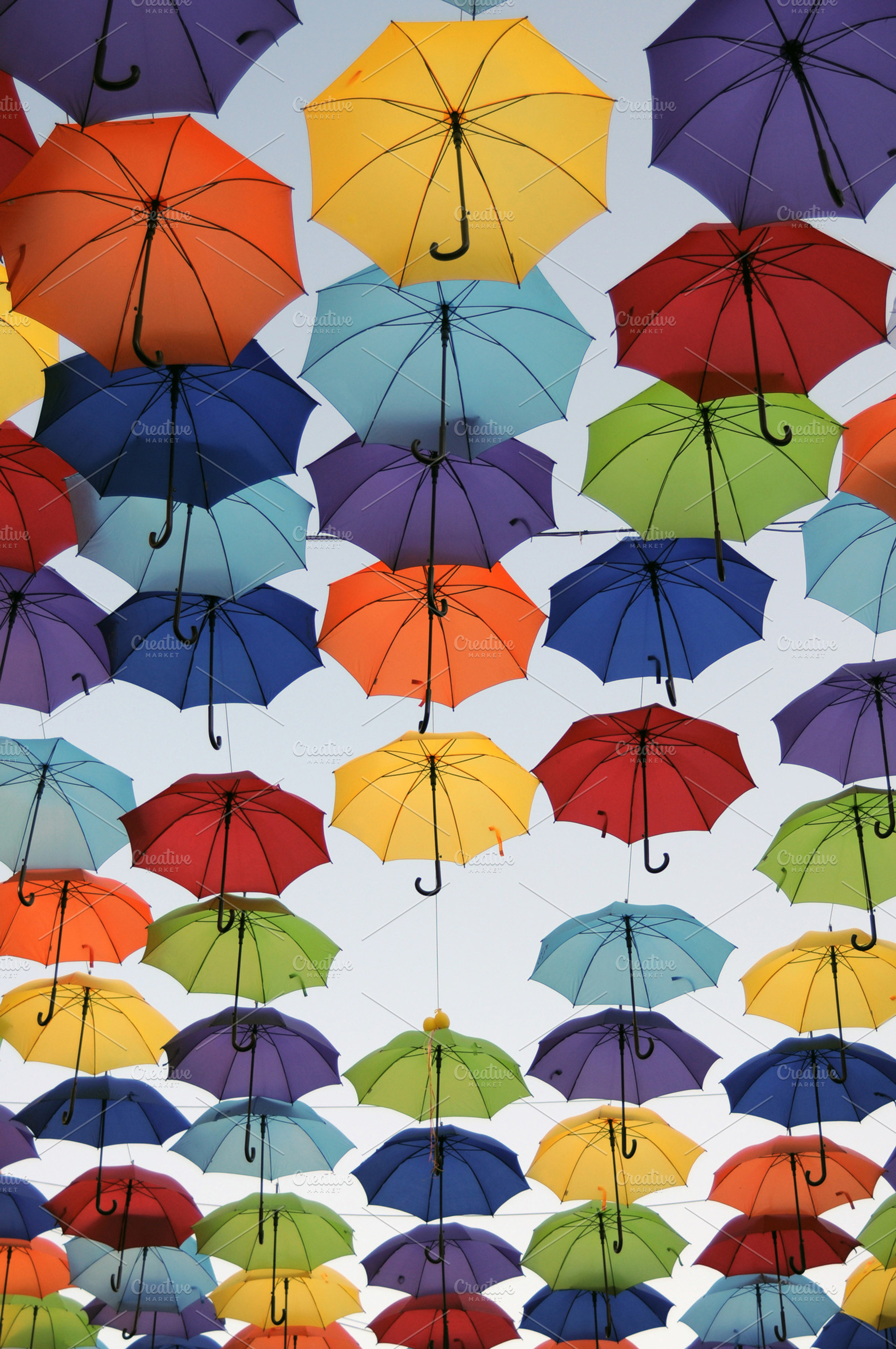 Colorful umbrellas containing sky, blue, and yellow, an Arts & Entertainment Photo by MashaCvijanovic