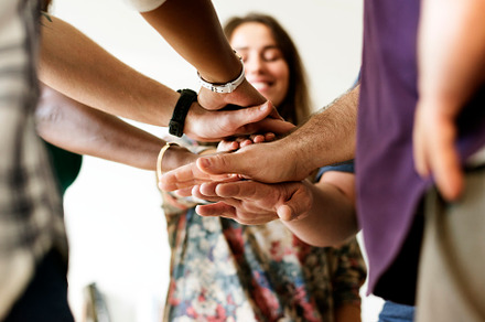 Group of diverse people joined hands containing achievement, adult, and, a Person Photo by rawpixel