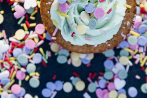 Cupcake with cream and sprinkles featuring bake, baked, and baker