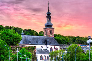View of the Schlosskirche and Saarbrucken Castle at sunset, an Architecture Photo by Leonid Andronov
