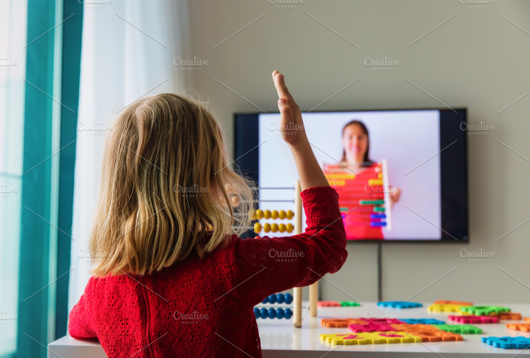 Kid doing online math lesson containing online, video, and lesson, a School & Education Photo by Nadezhda_Prokudina