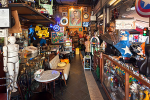 Posters, figurines in vintage store