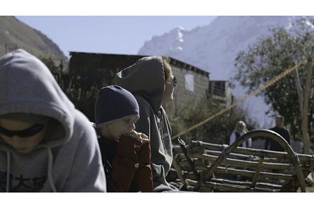 Family with child is sitting on pass, a Person Photo by Media Whale Stock