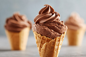 Chocolate soft-serve in a waffle cone, a Food & Drink Photo by AlyaAnd