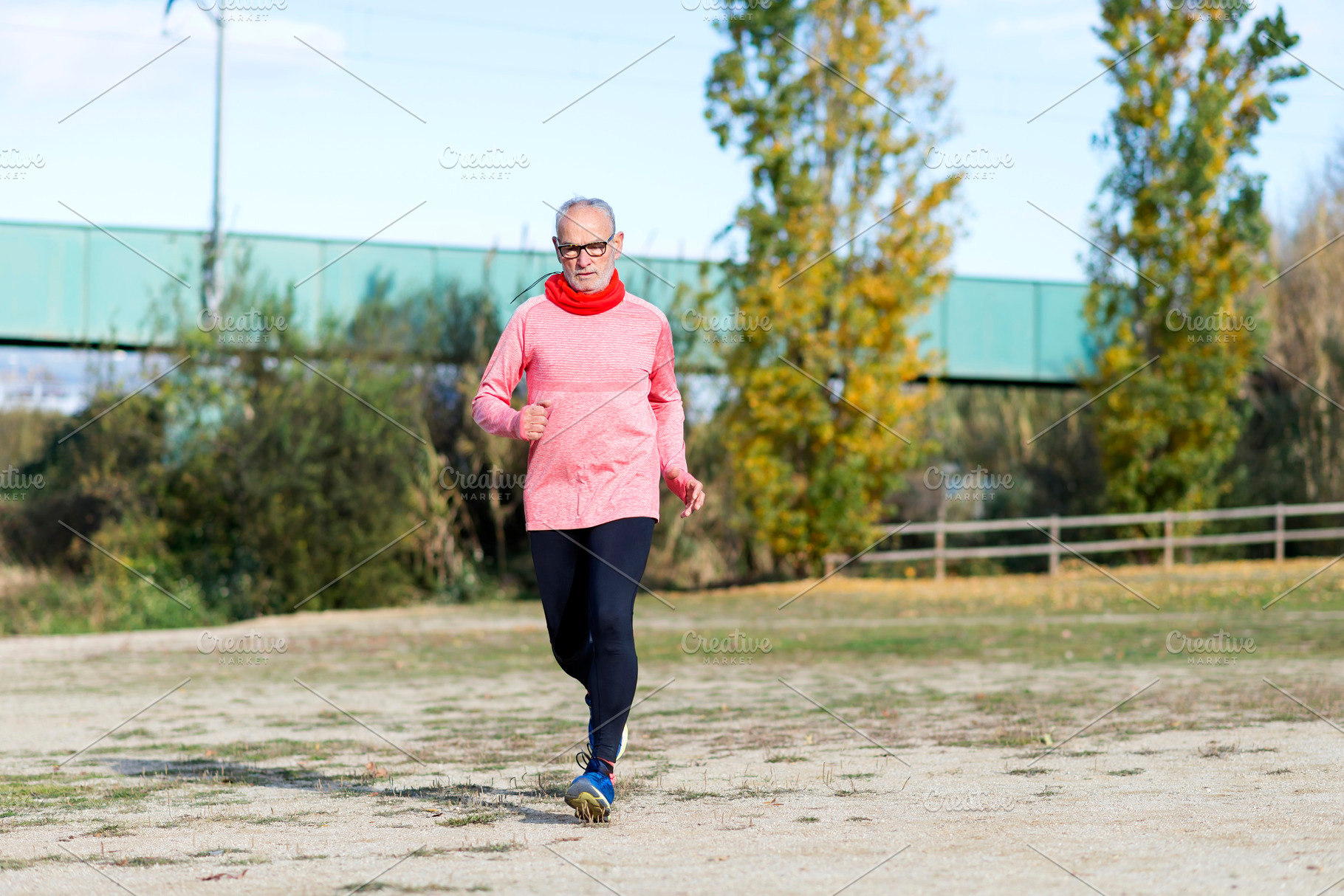 Senior man running outdoors in sportswear, a Sports & Recreation Photo by RF Images