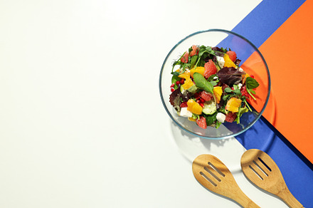 Concept of tasty food, salad with red orange, space for text, a Food & Drink Photo by AtlasStudio PRO