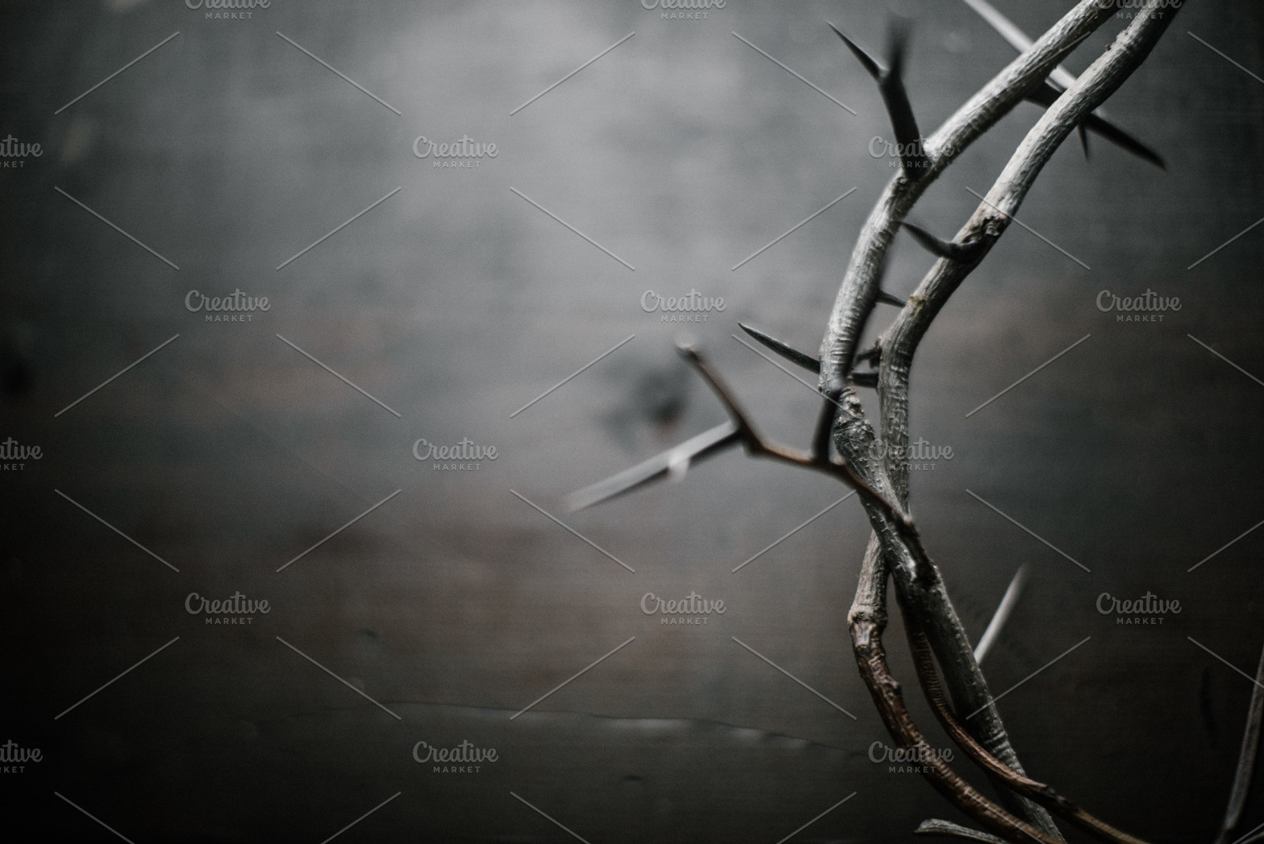 Crown of thorns containing dark, wood background, and crown of thorns, a Holiday Photo by GetMockups