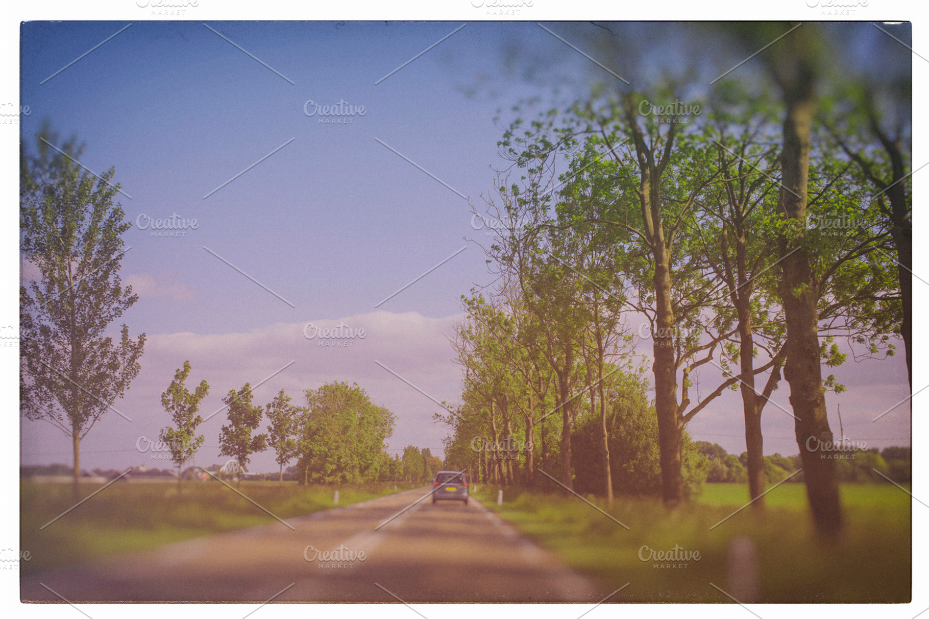 Car Driving On An Empty Road