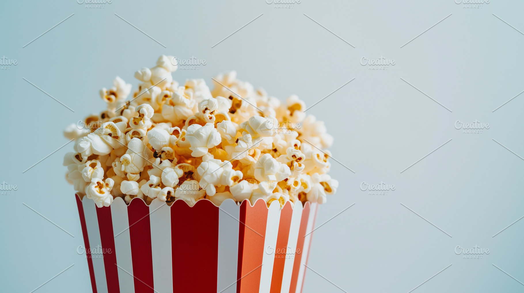 Popcorn in classic striped bucket, a Food & Drink Photo by MistyDay