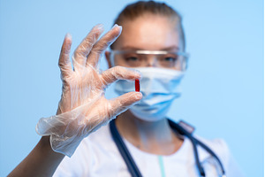 Healthcare professional in mask and, a Health & Medical Photo by volodymyrshtun13795