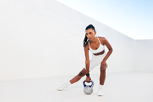 Full length of slim woman exercising, a Sports & Recreation Photo by Artem Varnitsin