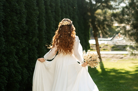 red-haired girl bride with a wedding bouquet, a Person Photo by Weddings, People, Travel