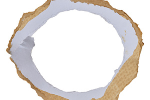 Round torn craft paper frame on isolated background, an Abstract Photo by ndanko