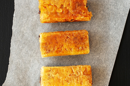 Homemade Baklavas with Honey, Chocolate and Almond on a black ba, a Food & Drink Photo by LiudmylaChuhunova