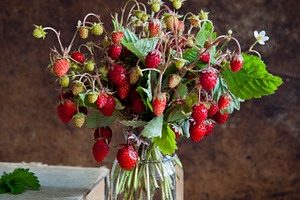 Strawberries and old books stock photo containing antique and berry