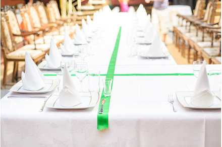 Long served table with plates, a Food & Drink Photo by Beautiful things