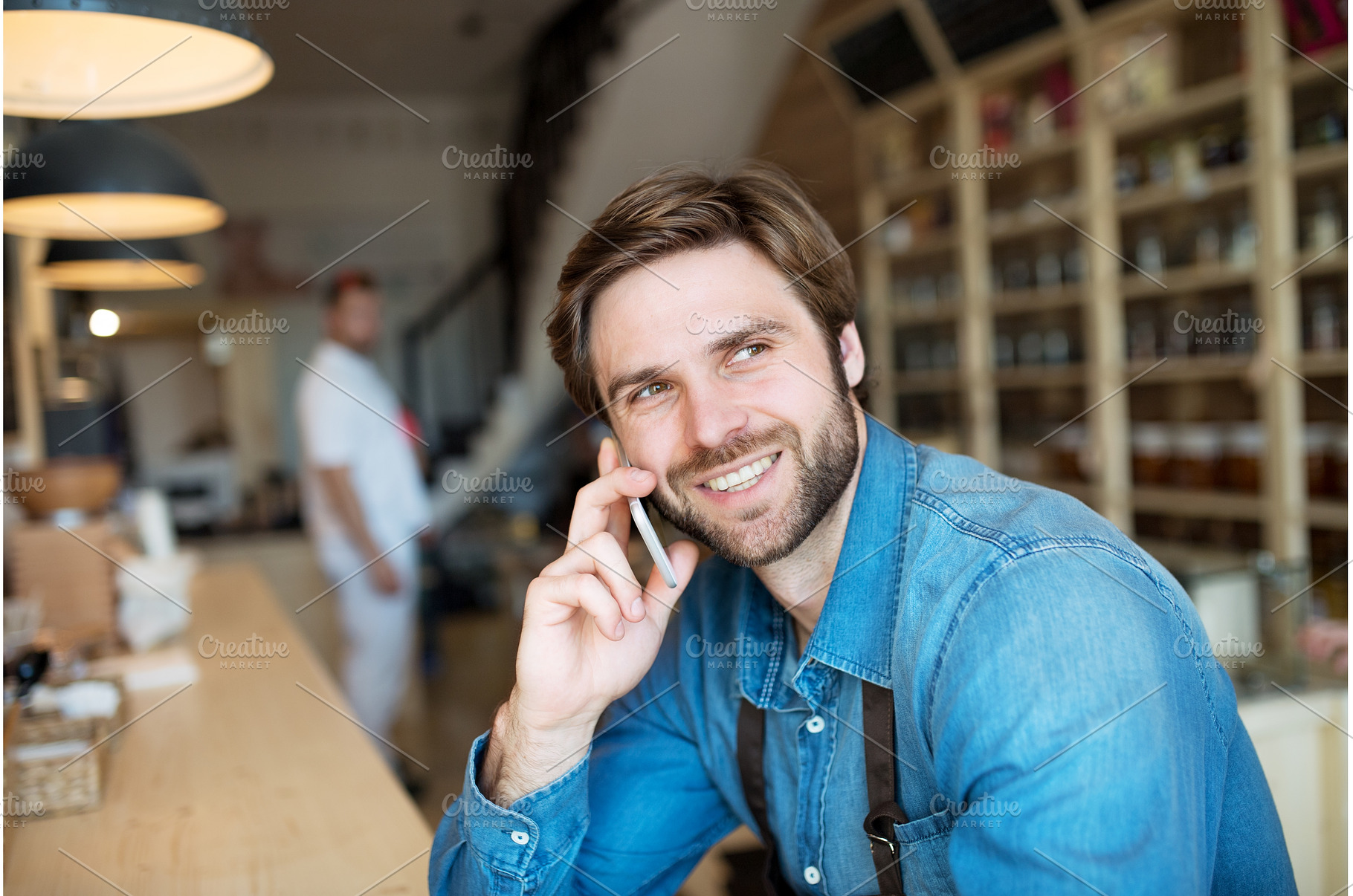 Man in small business, working in, a Food & Drink Photo by HalfPoint