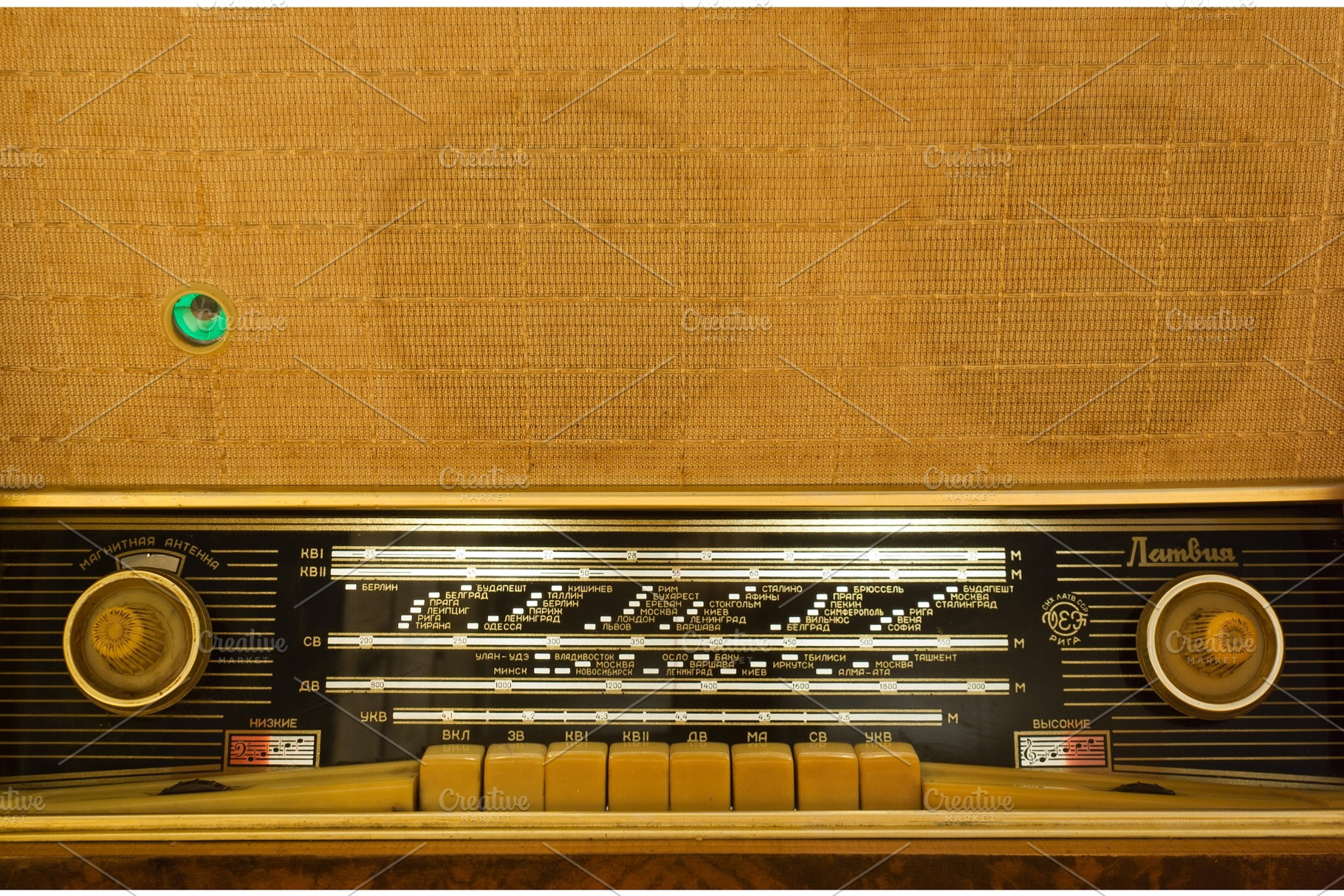 Vintage radio-gramophone working, a Technology Photo by Leonid Andronov