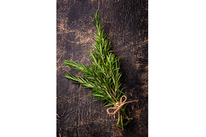 Fresh green rosemary on dark, a Food & Drink Photo by Yulia Furman