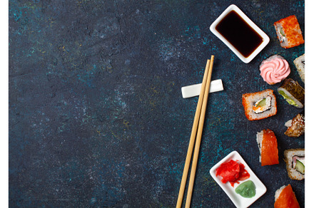 Sushi roll set with chopstick and, a Food & Drink Photo by LARISA BLINOVA