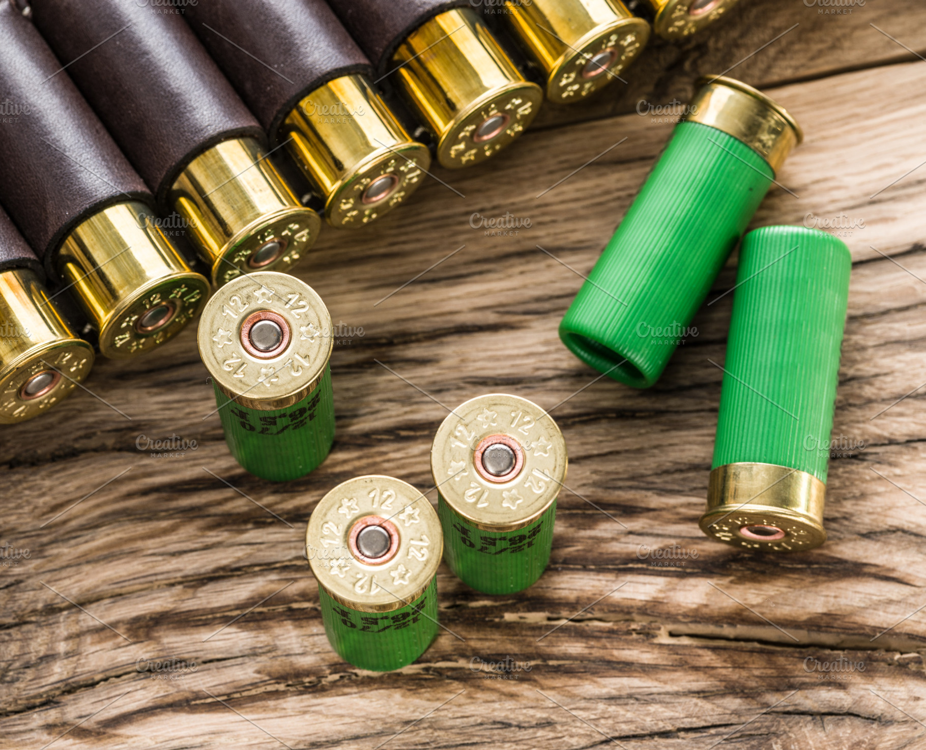 Hunting cartridge for pump shotgun on the wooden table., a Sports & Recreation Photo by Volff